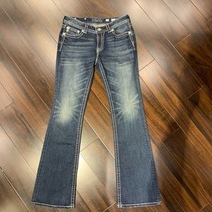 White thread lined boot cut jeans